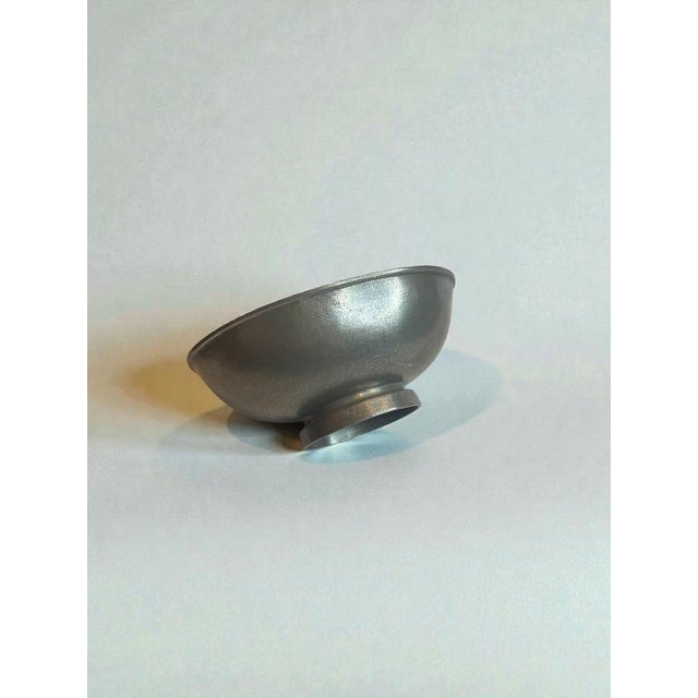A refined Swedish Modern pewter bowl designed by Edvin Ollers and produced by Schreuder & Olsson, Stockholm, in 1966. The...