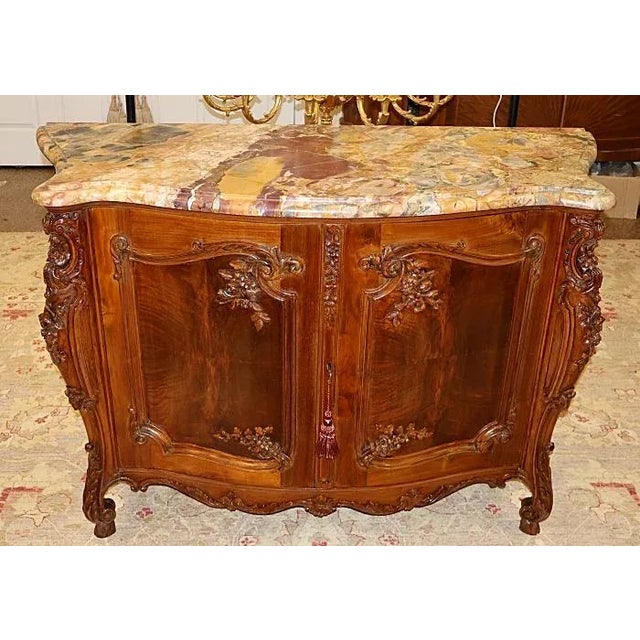 ​French Marble Top Louis XV Style Carved Circassian Walnut Buffet Chest Commode Dimensions : 55" Wide X 22" Deep X 37"...