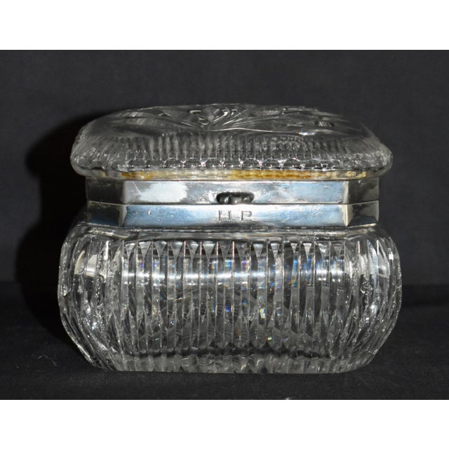 Antique (1920's) Lidded Box made of American Brilliant Cut Glass with a Silver Plate Trim. The Measurements: 4.75"W x...