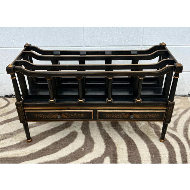 The Vintage Regency Ebonized Textured and Gilt Canterbury is a truly remarkable piece that exudes elegance and...