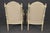 Add timeless European charm to your home with this stunning pair of French inspired faux bamboo armchairs. Beautifully...