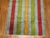 Unusual vintage Turkish rug with a colorful vertical striped motif on a blue field. Measures: 3'9'' x 6'10''.