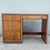A refined vintage Huntley campaign desk by Thomasville, showcasing the enduring appeal of classic campaign-style design....