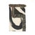 This black and cream abstract woven throw blanket features sweeping brushstroke shapes, textured cotton construction, and...