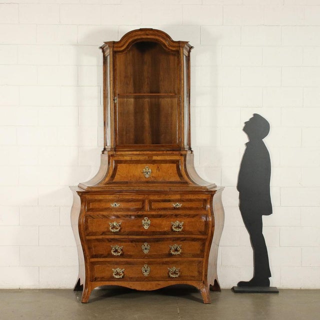 Large chest of drawers with barocchetto shelf from Emilia, with the typical curved and rounded on silhouette on the front...