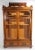 Impressive double door Victorian, Aesthetic Movement bookcase with unusual storage drawers on the top. The doors open to...