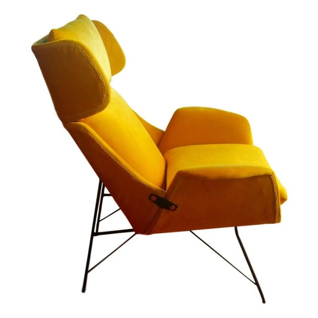 armchair designed by Augustus bumps Saporiti, early 50s. structure of bent plywood to three sections of frame in black...