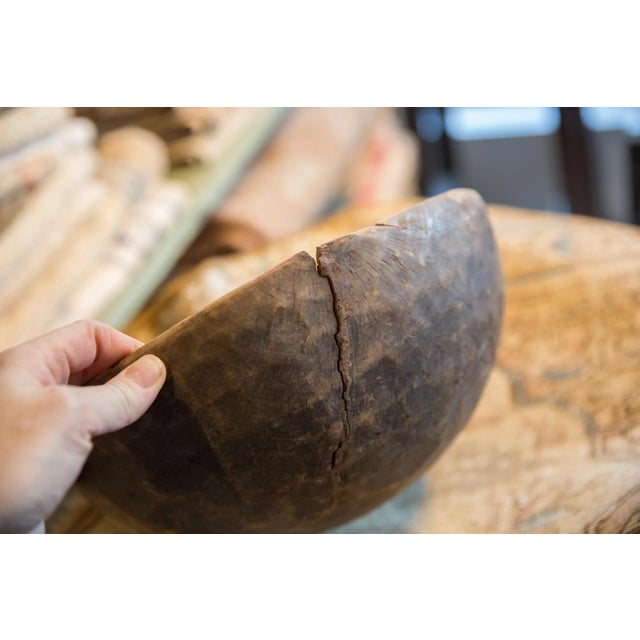 :: Vintage handmade African wooden bowl with tons of character and charm. Please note this is an aged and lived with item,...