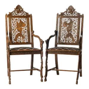 Early 20th Century Pierce Carved Wayang Kulit Teak Chairs - a Pair