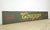 Reclaimed movie set sign made of aluminum in a yellow, red, and green color. The sign reads "96, Cougar, Italian...