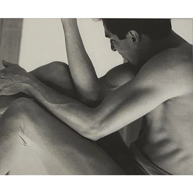 A Vintage black and white photograph of a male dancer, circa 1970.