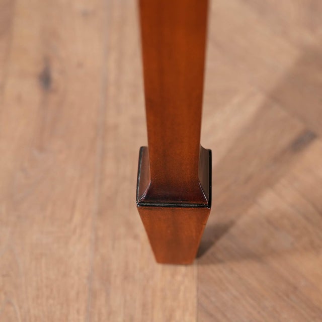 A high quality Small Mahogany Banded Desk from Niagara Furniture made of mahogany and satinwood with solid brass drawer...