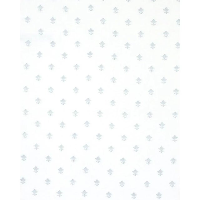 Rubia Sheer's stylized flowers are rendered in an irregular running stitch on a diaphanous linen ground. Endlessly...