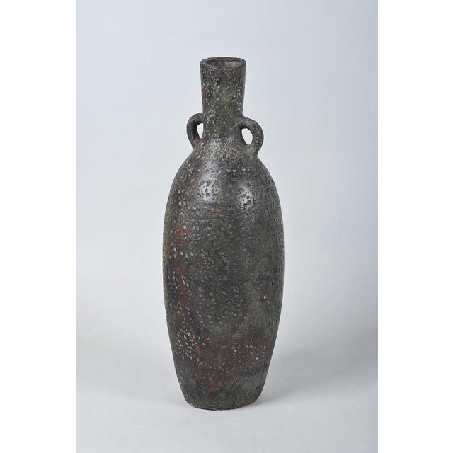 This elegant ceramic vase originates from 1920s Czechoslovakia and stylistically belongs to the Art Deco period. Its...