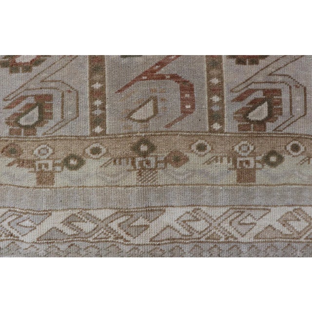 Mid 20th Century Vintage Turkish Oushak Unique Tribal Design in Earth Tones 3'5"x6'2" For Sale - Image 5 of 10