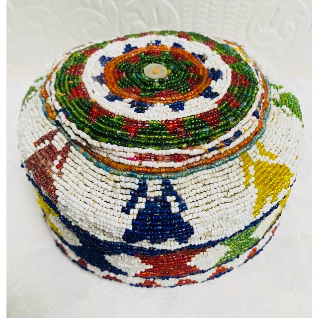 This is a very beautiful hand beaded piece of art that can be used for display or worn. Truly, a one-of-a-kind piece!