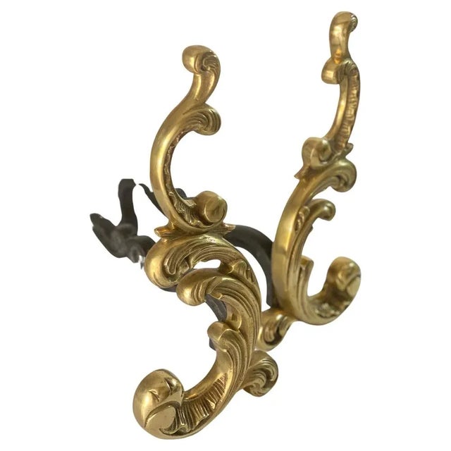 Pair of Andirons, in brass and steel. with parts representing duck heads and plants. They were made in France in the XIX...