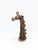 A striking giraffe sculpture featuring an elongated neck composed of irregular wood sections, crowned by an expressive...