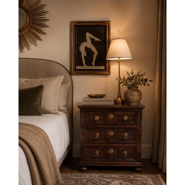 Handsome 1970s nightstand or end table by Henredon, featuring a classic English-inspired design with a rich dark wood...