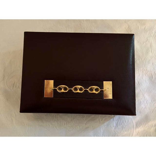 Cool 1970's dark brown leather unisex Swank jewelry box made in Sweden. Raised Mariner link hardware also known as the...