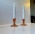 A pair of low candlesticks for regular sized candles. The are made from solid copper and features fluted bases. Designed...
