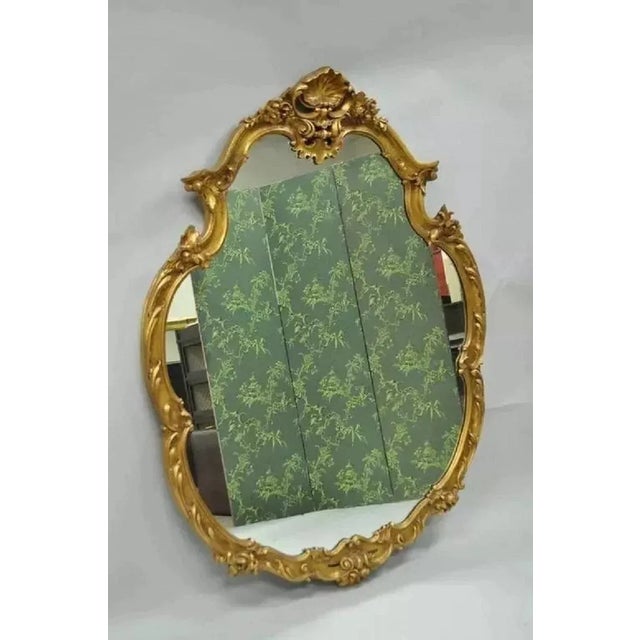 Large Vintage French Rococo Louis XV Style Shell and Floral Carved 65" Gold Wall Mirror. Item features attractive molded...