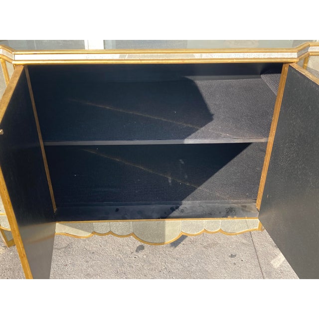 Michael Taylor original Regina Sideboard in the Hollywood Regency Style with Antique Mirror and Gilt details . All the...