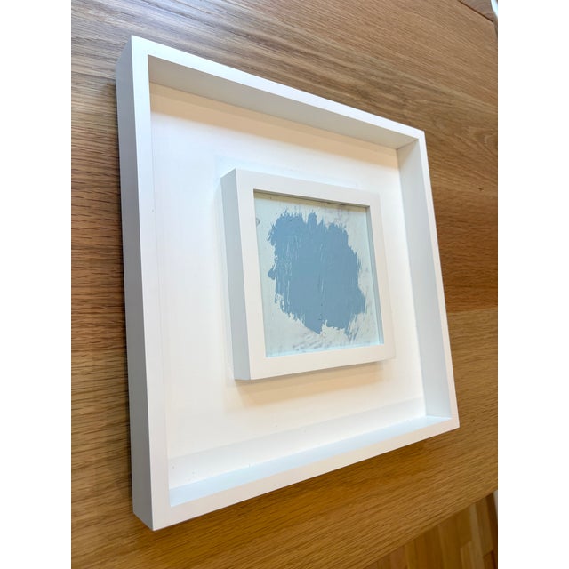 Acrylic on cradled wood panel, framed in a duo style white wooden frame, 13 x 13 x 1.5. Back wired, ready to hang. Signed...