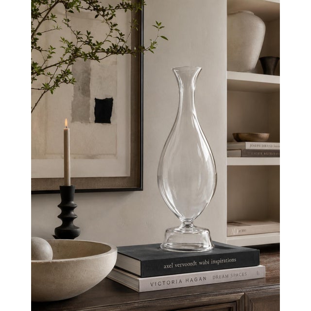 An exceptional and increasingly collectible signed PIMS blown glass bottle or sculptural vase designed by celebrated...