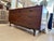Mainline by Hooker Furniture 9 drawer lowboy dresser in walnut veneers. Known for its distinctive bowed facade and...