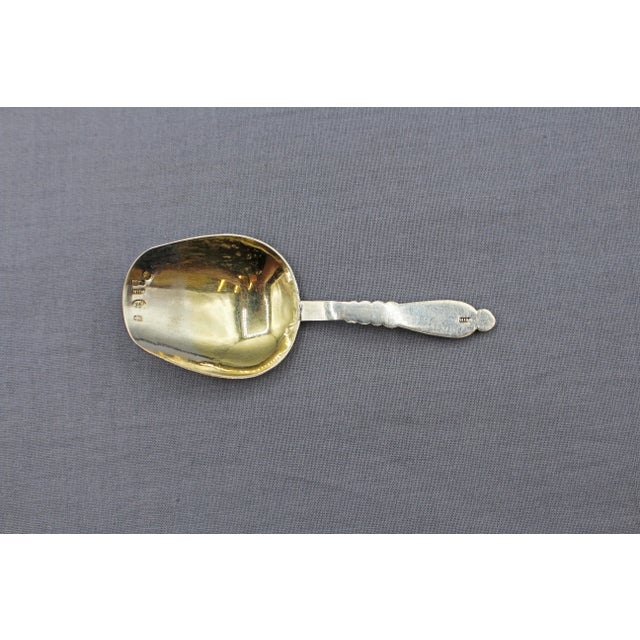 Russian tea caddy spoon, 84 zolotniks, Moscow, circa 1908-1917. 84 zolotniks is 875 standard silver. By the prominent...