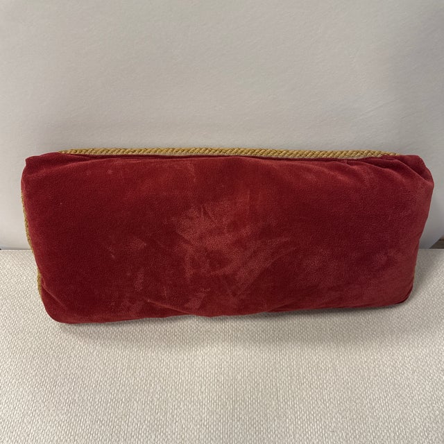 Design Plus Gallery presents a Regency Style Ruby Velvet Lumbar Pillow. The rectangular pillow is upholstered in plush red...