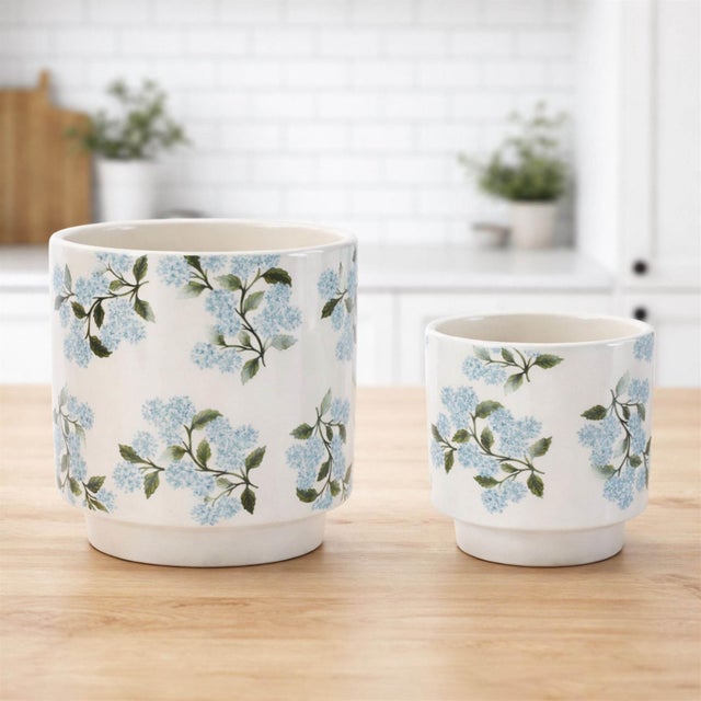 Bring a breath of fresh garden charm indoors with this sweet Hydrangea Floral Dolomite Planters Set! Featuring delicate...