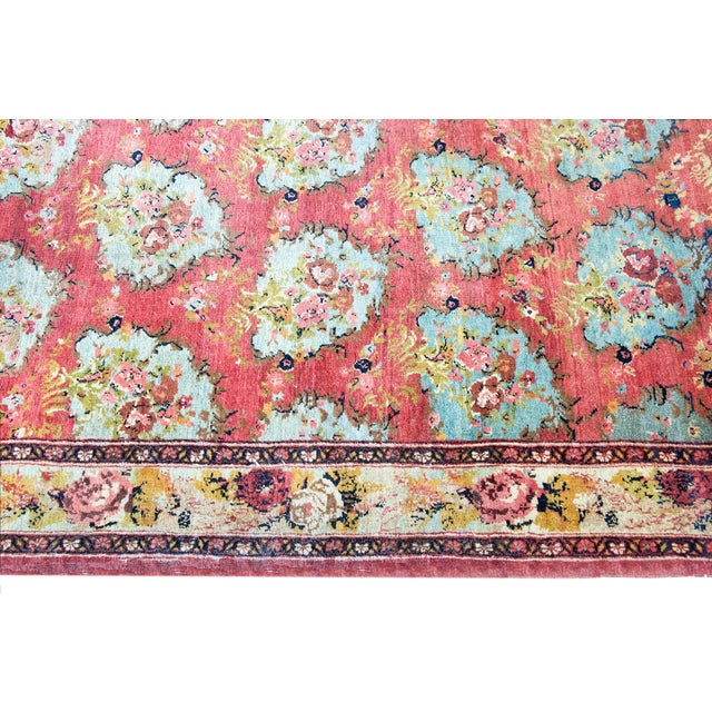 This early 20th-century Persian Bidjar rug stands out for its highly unusual designan array of asymmetrical, baroque-...