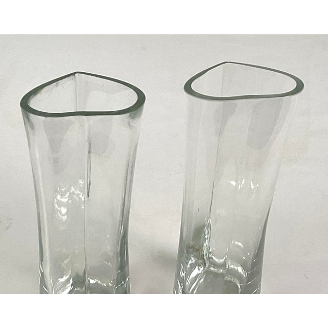 A pair of hand blown, polished, heart shaped vases 9.75 inches high and 2.5 inches wide Polished and finished pontils on...
