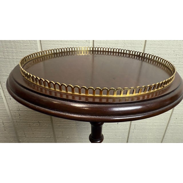 This elegant vintage pedestal plant stand brings timeless charm and functionality to any space. Crafted from rich...