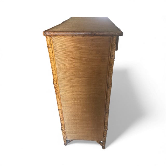 Gorgeous rare, hard to find tortoise tiger bamboo & linen cloth cabinet . One drawer and three interior shelves that have...