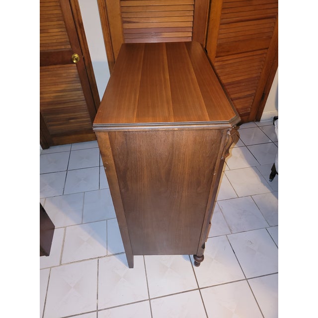 Antique solid walnut chest of drawers by Northern Furniture Company Sheboygan, Wisconsin, consisting of three small...