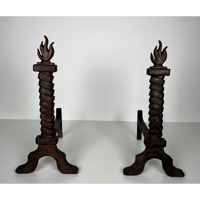 These rare, very beautiful and interesting flame anditons are made of cast iron and wrought iron. This is a French work in...