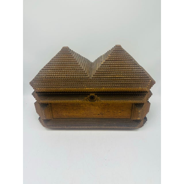 This is a vintage Black Forest–style tramp art carved wooden trinket box featuring a distinctive pyramid or chalet-style...