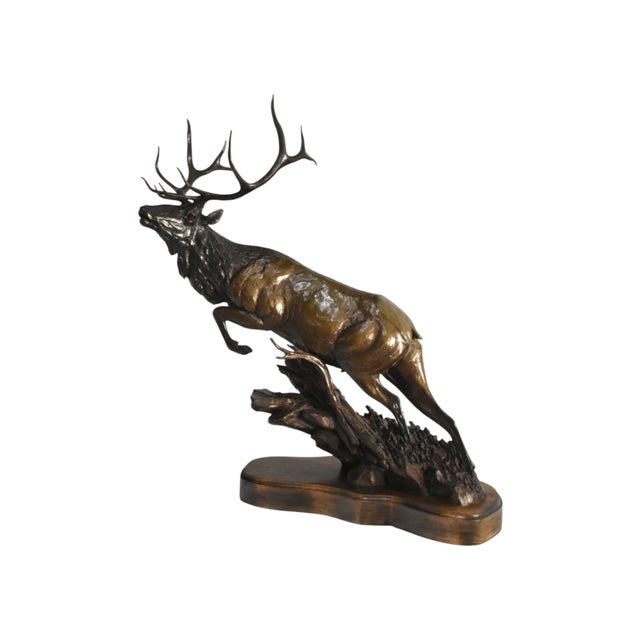 Fantastic dynamic bronze sculpture titled "Flight," depicting a majestic Rocky Mountain bull elk mid leap, by Pacific...