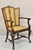 Antique Victorian Walnut and Cane Carved Lounge Arm Chair w/ Queen Anne Legs. Circa Early 20th Century. Measurements:...