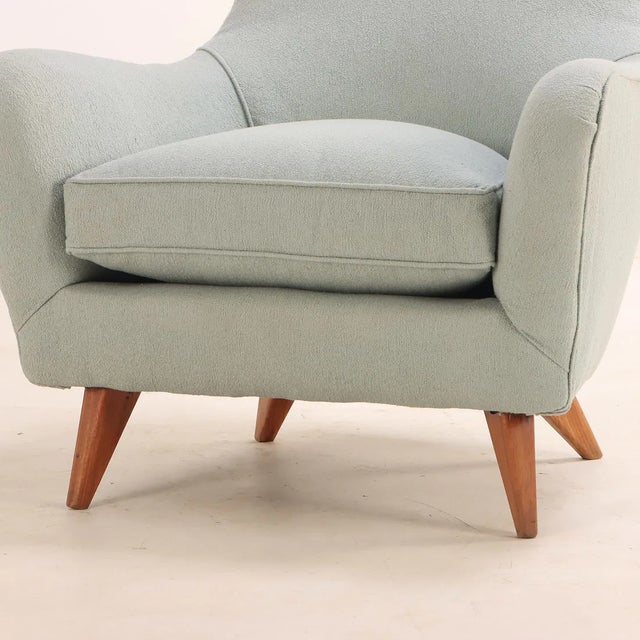 This charming pair of Italian Mid-Century Modern lounge chairs embodies the elegance and sophistication of 1950s design....
