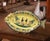 Bring cheerful Breton character to a table, kitchen, or wall display with this colorful faience fish platter. Crafted in...