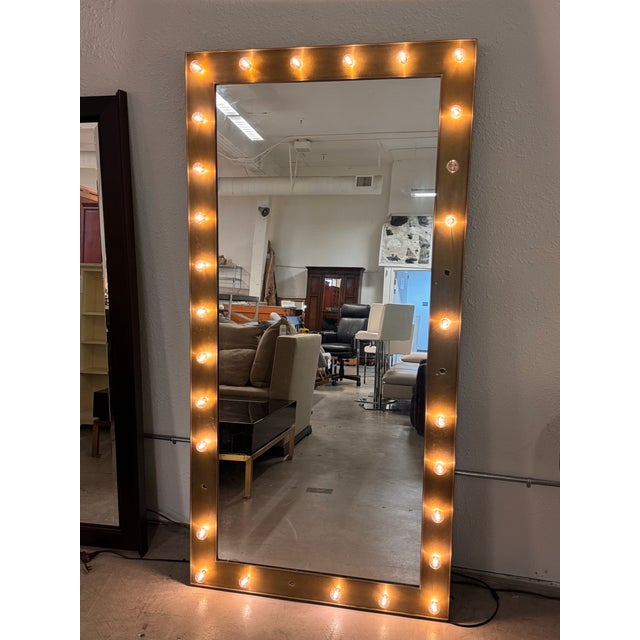Design Plus Gallery presents the Illuminated Leaner Mirror in Aged Brass from RH Teen / Restoration Hardware. The large-...