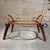 For your consideration, a Jens Quistgaard for Dansk Designs casserole stand, constructed from wood and rattan in the 1950s...