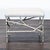 An upholstered ottoman with a branch-style iron base in transitional silver. Brand: John-Richard. Original Price: $1812....