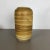 This original vintage vase was produced in the 1960s in Germany. It is made of ceramic pottery in fat lava optic with...