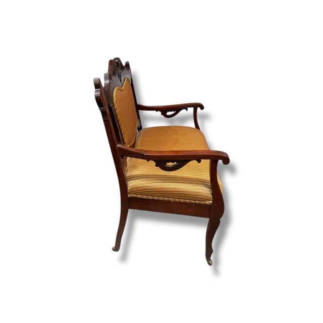 This charming pre-loved loveseat on wheels blends classic craftsmanship with practical versatility. Crafted from rich,...