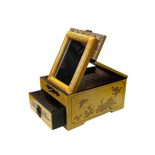 This is a Chinese decorative accent storage box with an oriental accent flower bird graphic on the surface. There is a...